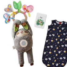 Load image into Gallery viewer, Santi The Sloth grey plush toy with sound machine, white power bank, and navy sleep bag with stars and clouds.