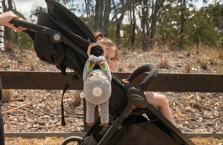 The Santi Mini attached to a pram for a day out